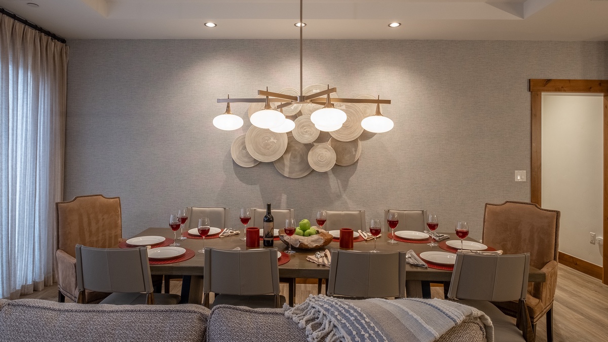 Dining Area, Main Level - Dining table with seating for ten beneath statement chandelier