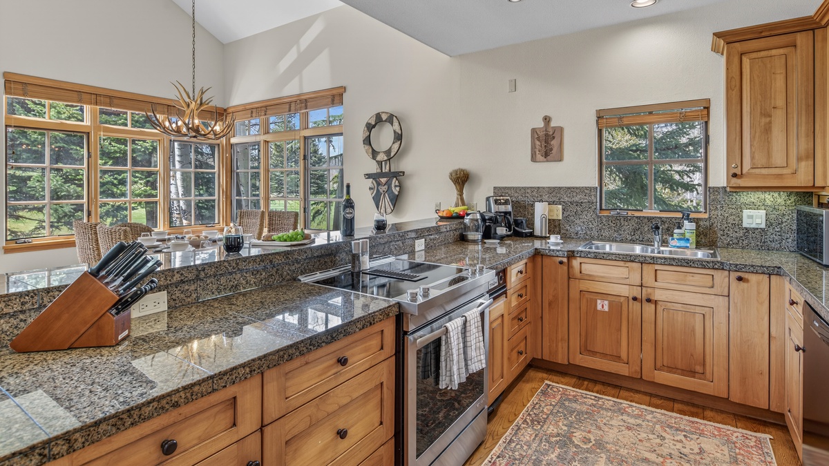 Kitchen, Main Level - Range with stone countertops