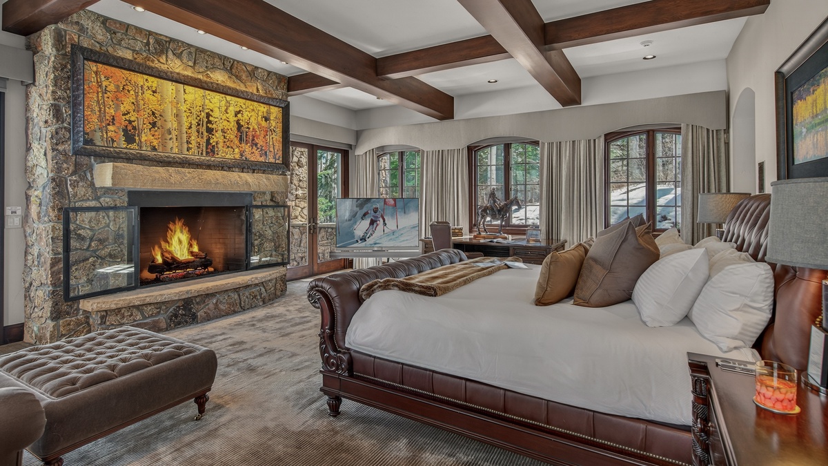 Bedroom 1, Lower Level - Primary King bedroom with fireplace