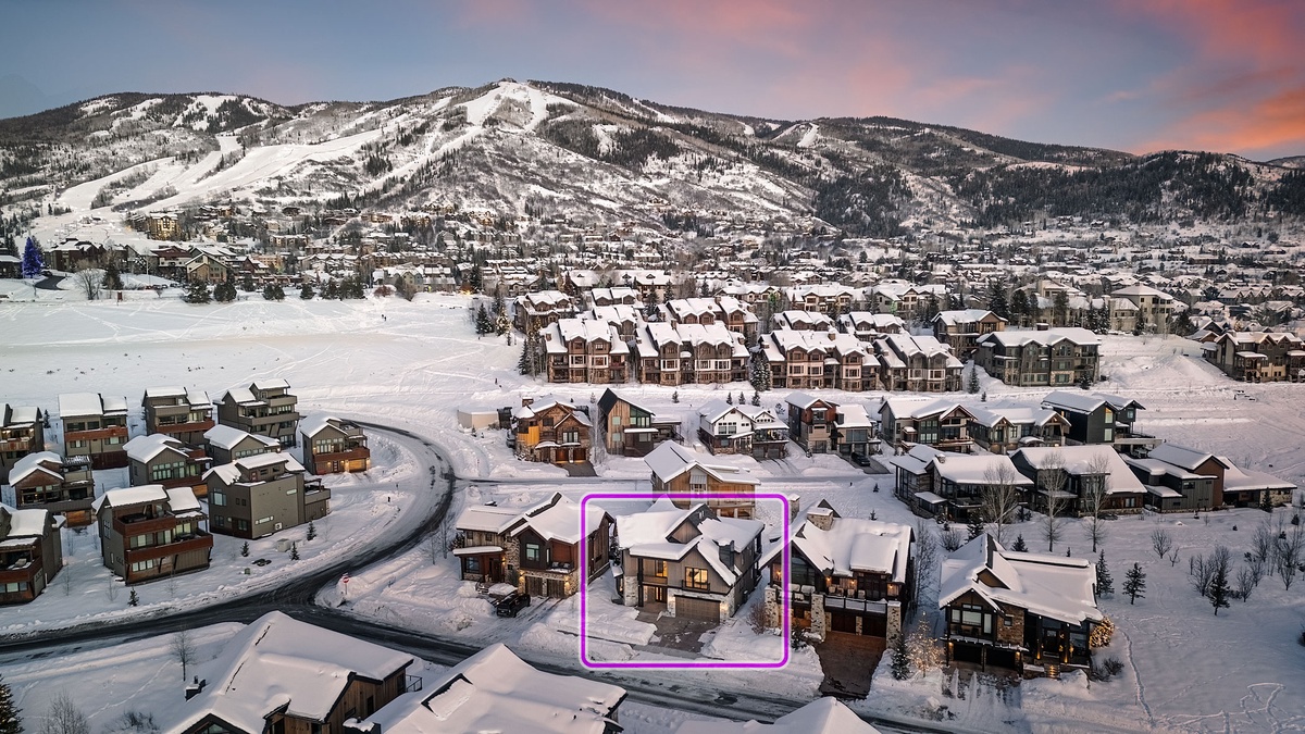Aerial view of home and view of ski resort.