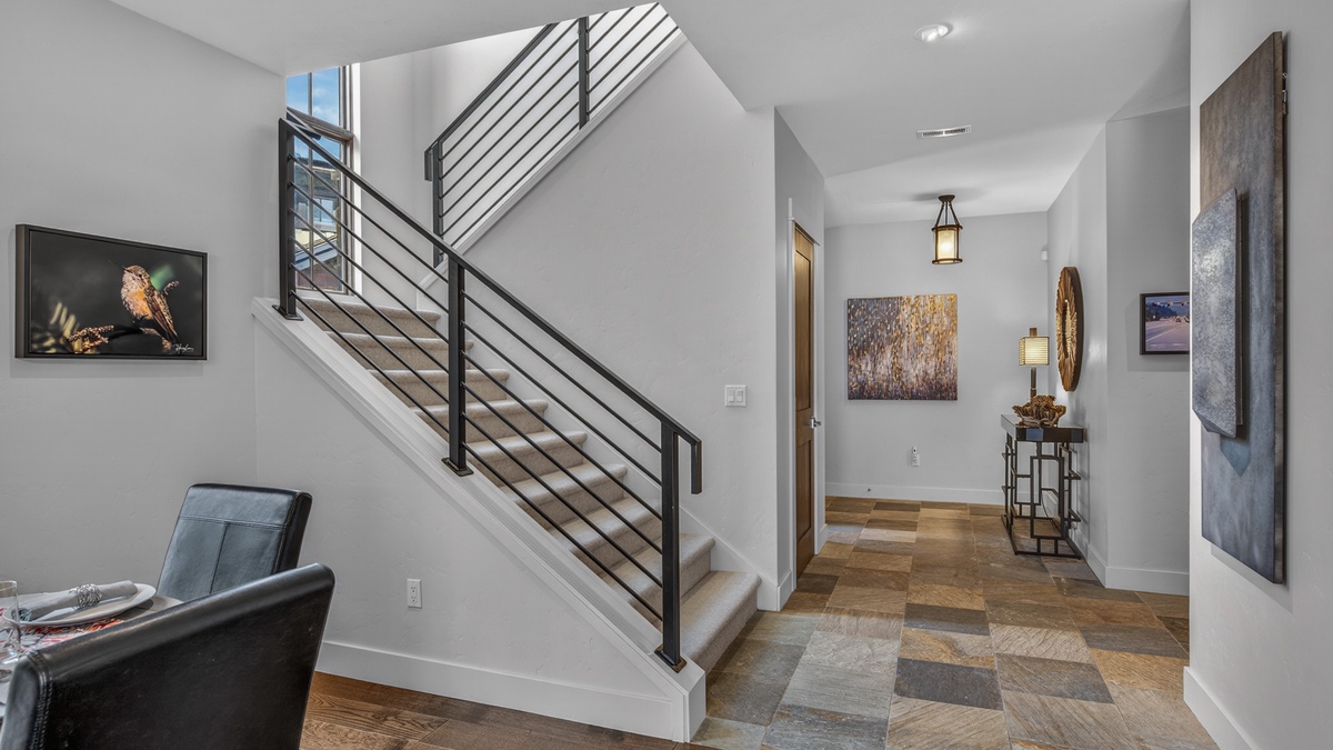 Entry area with staircase and tile flooring