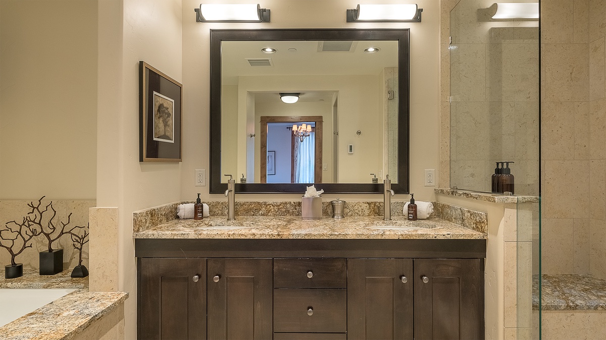 Bedroom 1, Main Level - Primary king ensuite with double vanity and walk-in shower