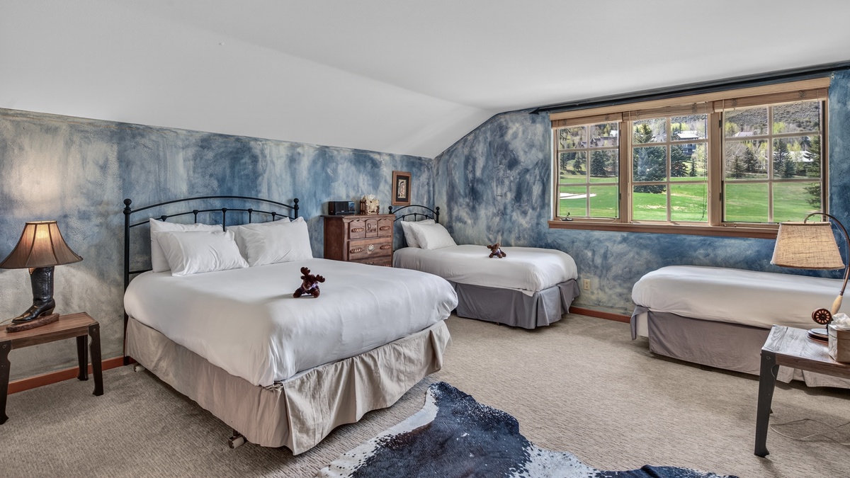 Bedroom 3, Upper Level - Queen bed and two twin beds