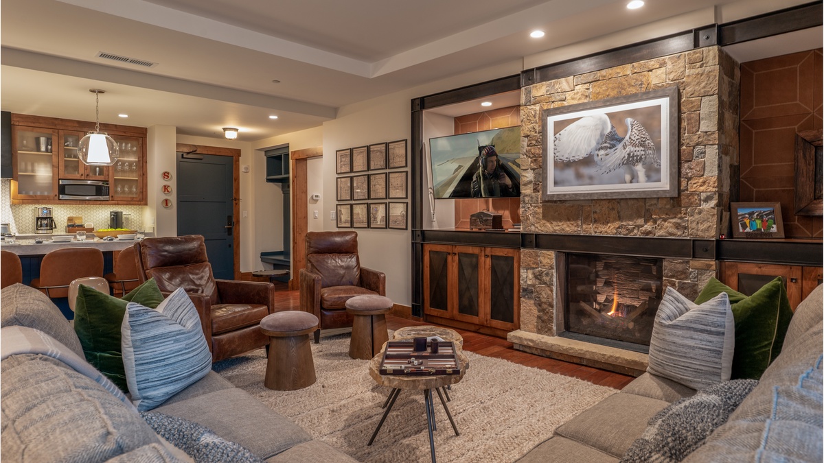 Great Room, Main Level - Fireplace with TV and seating area