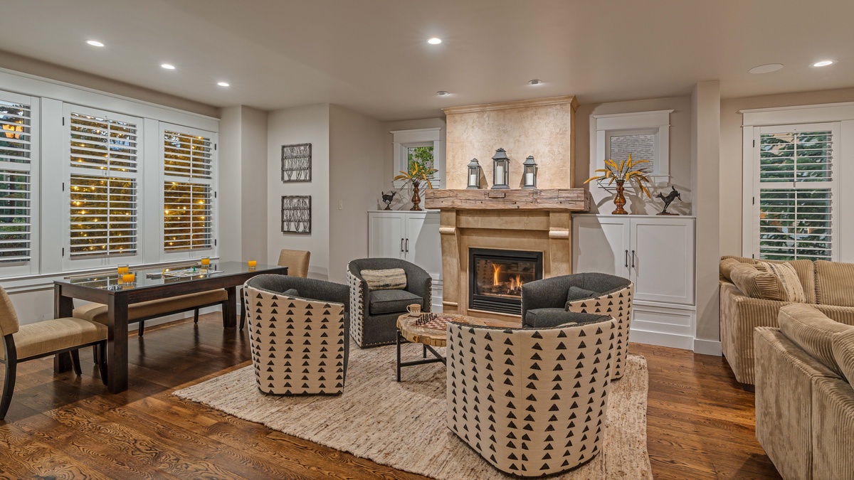 Main level great room with plenty of seating and gas fireplace