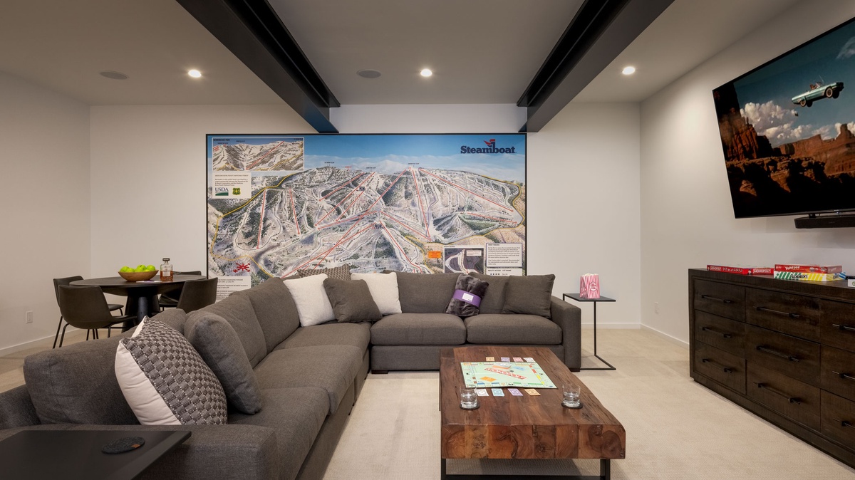 Recreation Room, Lower Level - With sectional sofa and wall mural