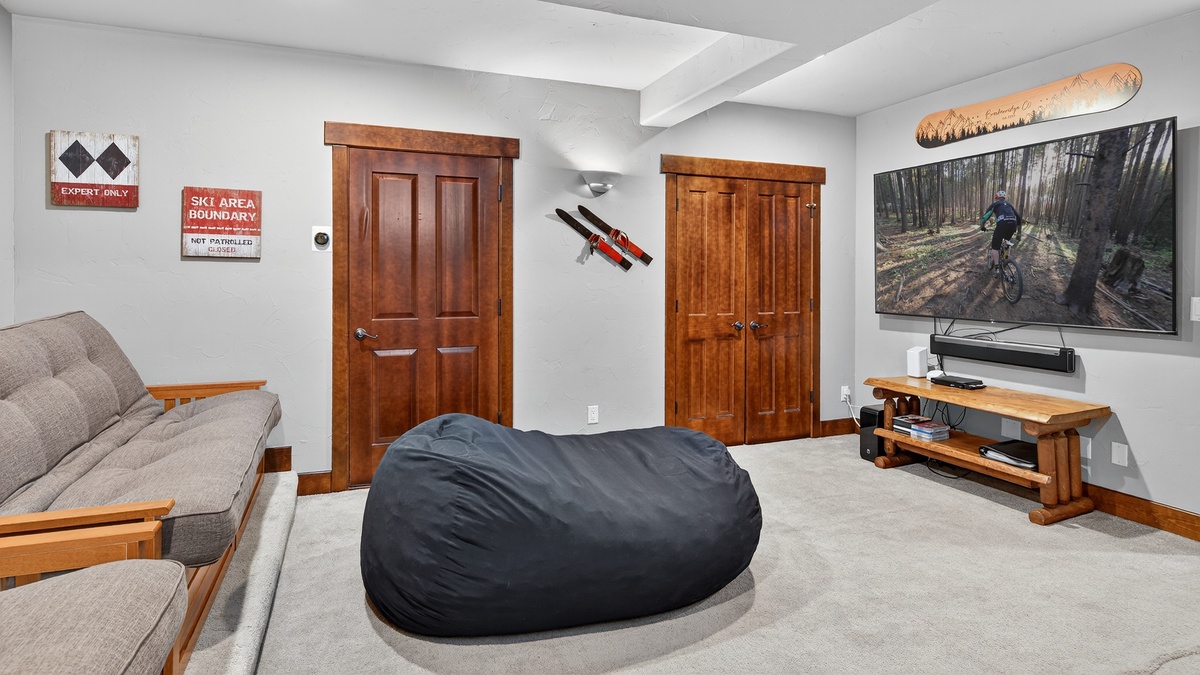 Entertainment Room, Lower Level - With big screen TV and two queen futons