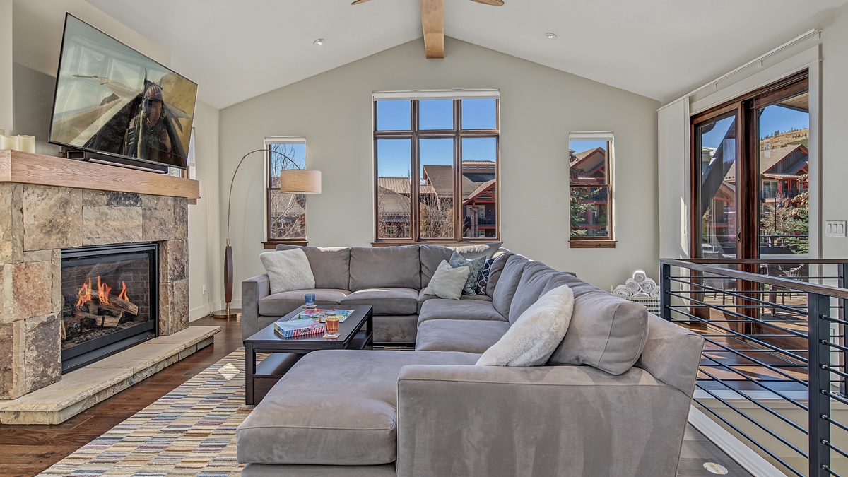 Great Room, Main Level - Sectional seating with vaulted ceiling and large windows