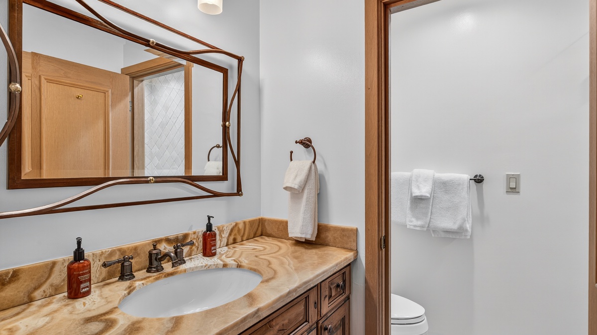 Hall Bathroom, Main Level - With a stand-alone shower