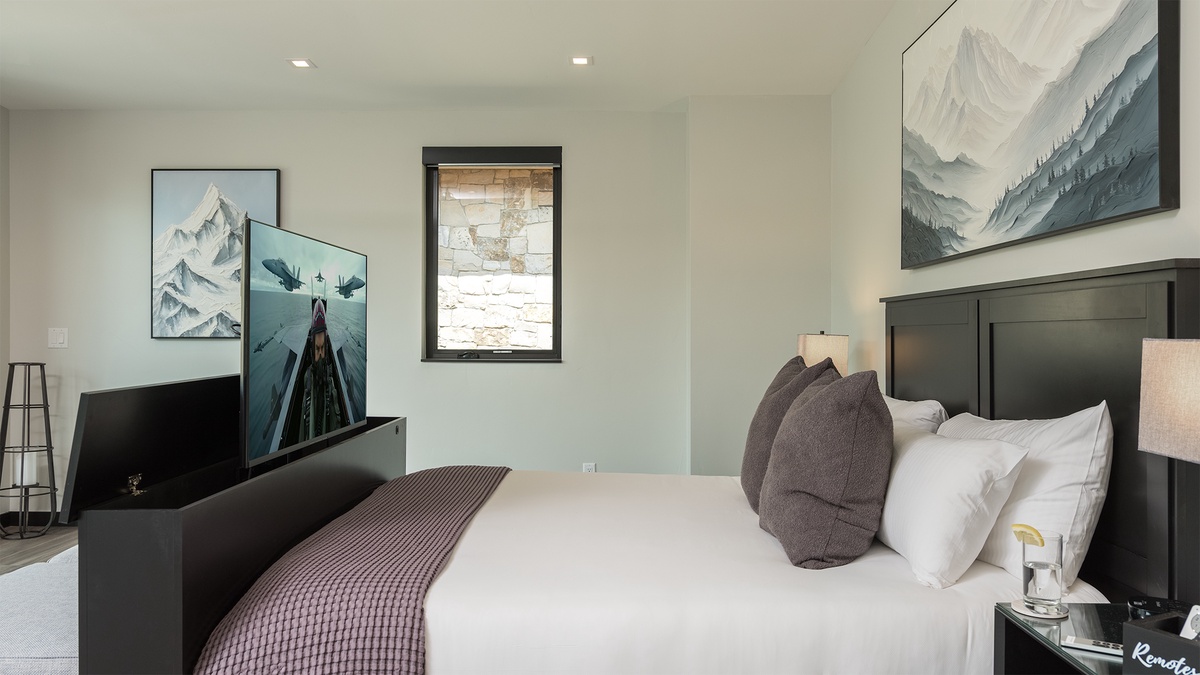 Bedroom 1, Upper Level - Primary king suite with television