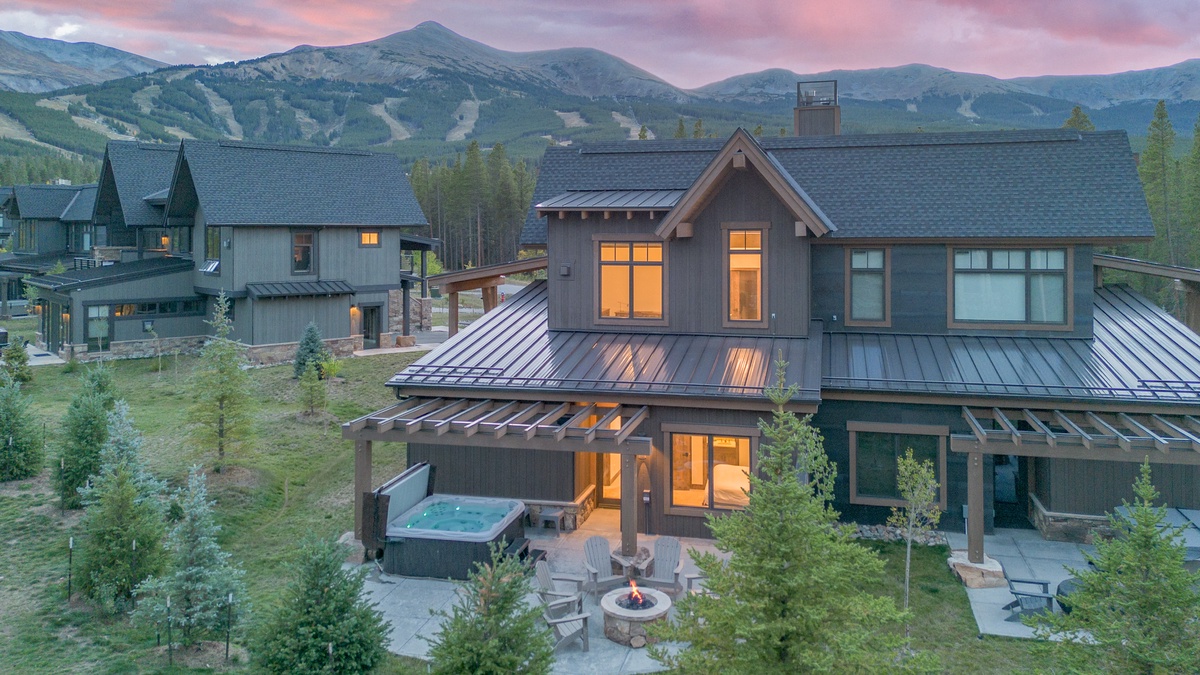 Exterior - Rear exterior view with hot tub and fire pit