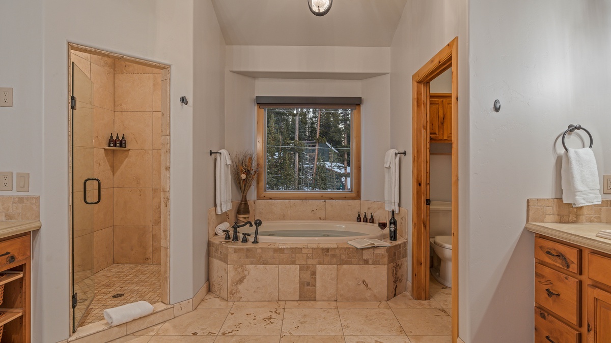 Bedroom 1, Main Level - Primary ensuite on main level with spa tub