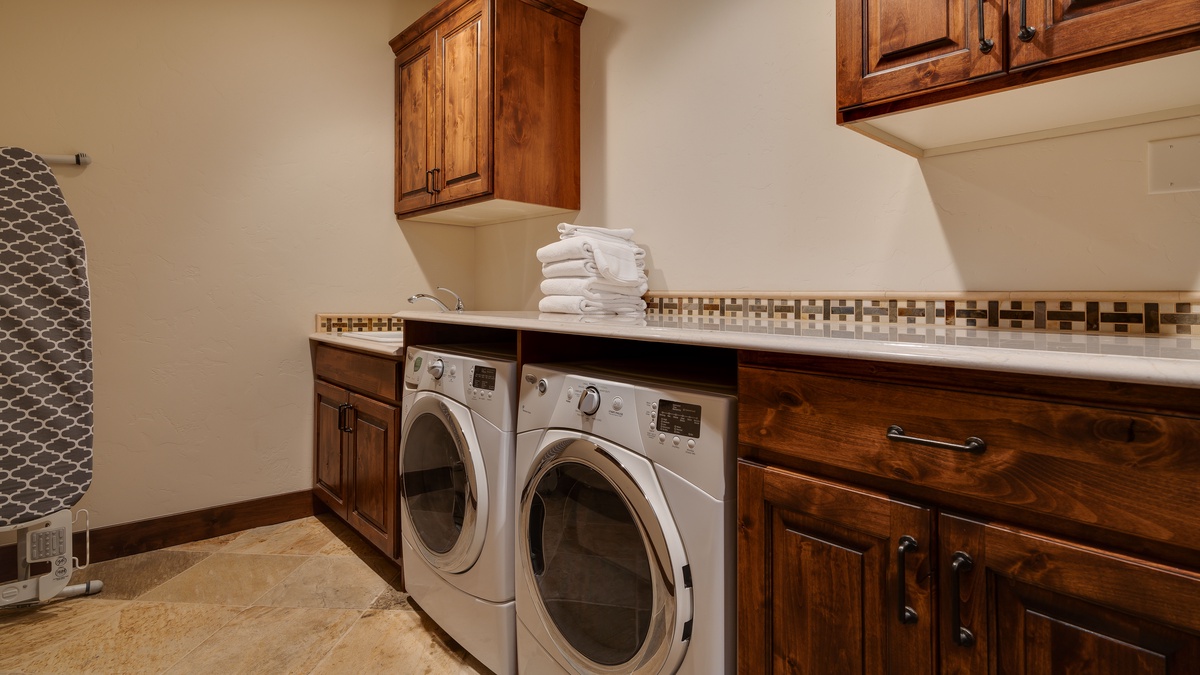 Laundry, Upper Level - With side-by-side washer and dryer