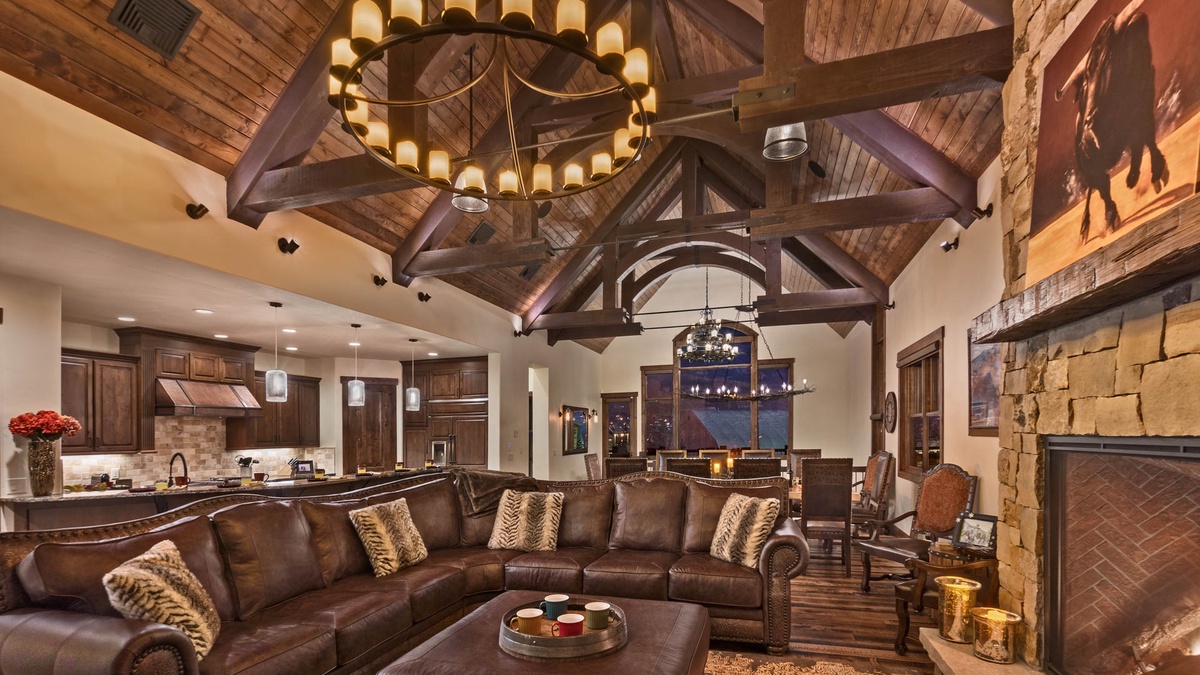 Great Room, Upper Level - Sofa seating with fireplace and tall ceiling