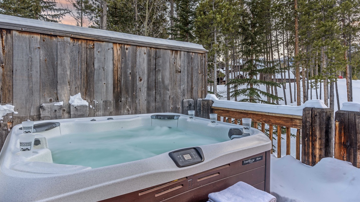 Private hot tub off the upper level primary suite