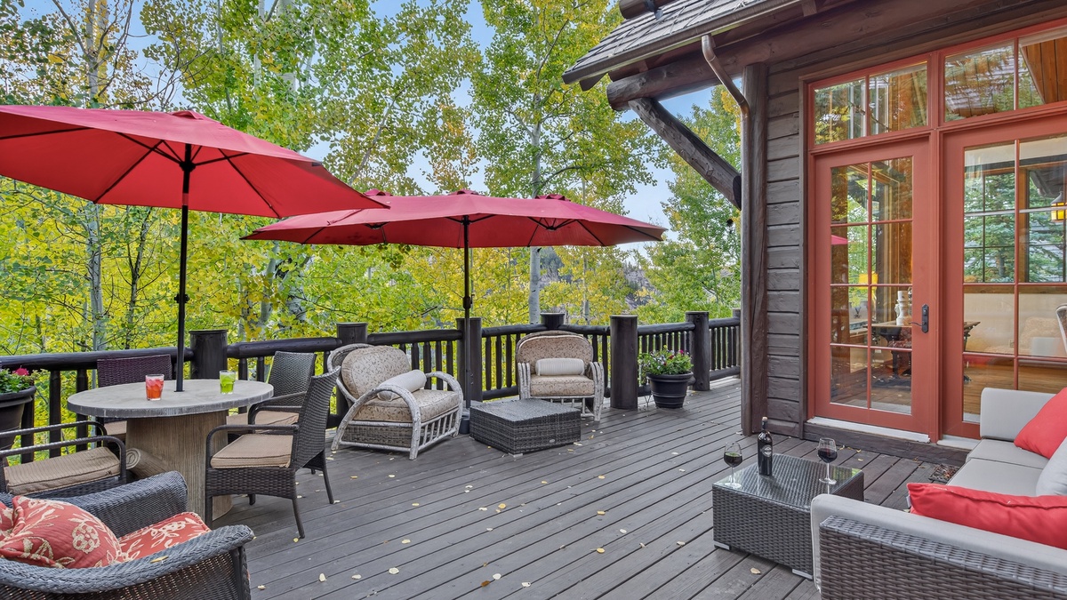 Deck, Main Level - Outdoor seating area with umbrellas and views