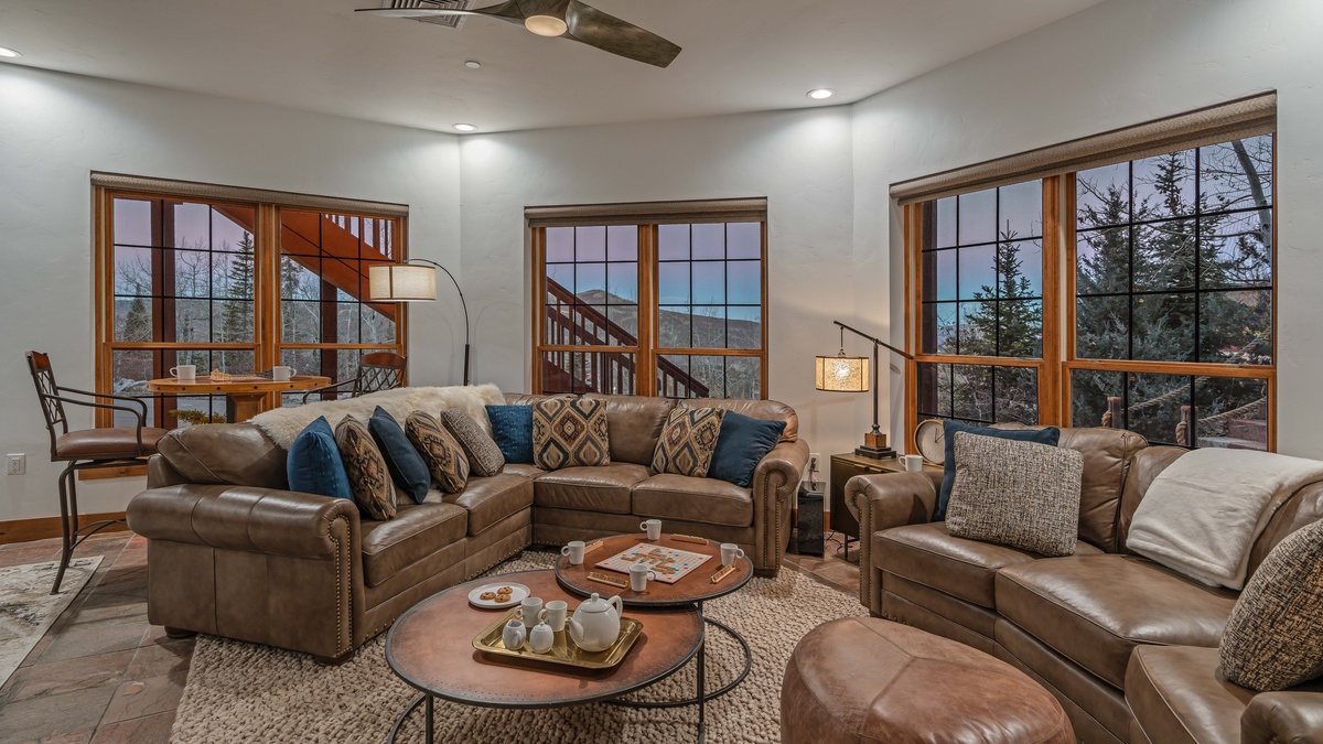 Cozy sitting area on lower level with gas fireplace