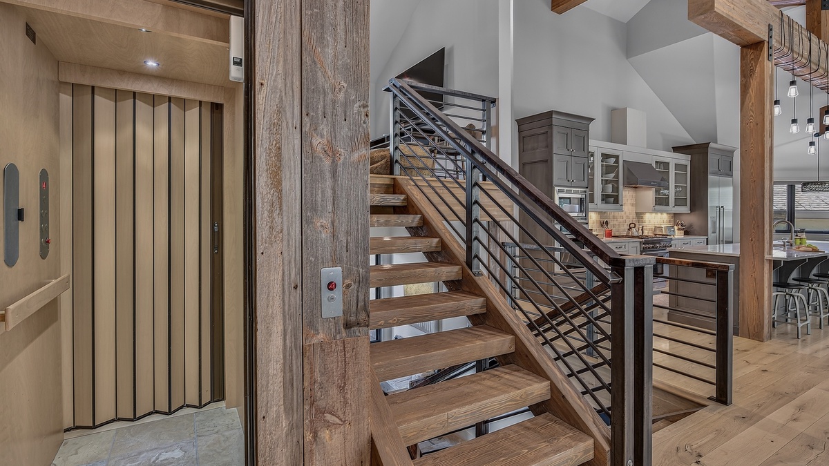 Elevator, Upper Level - Stairwell beside elevator