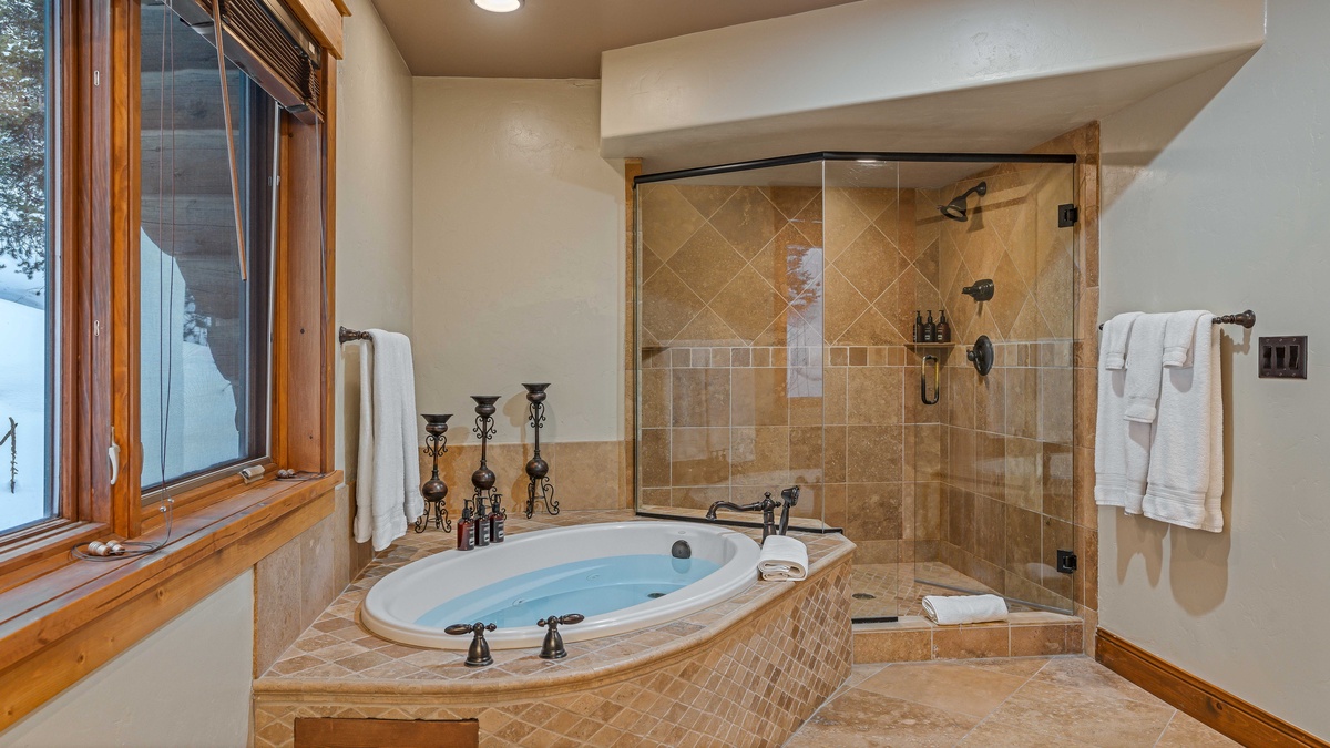Bedroom 1, Upper Level - Primary king ensuite with soaking tub and shower