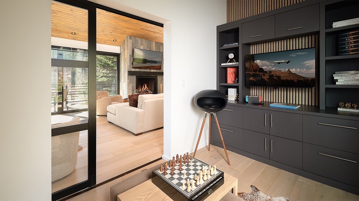 Entertainment Room, Main Level - There is a queen sleeper sofa located in this room.