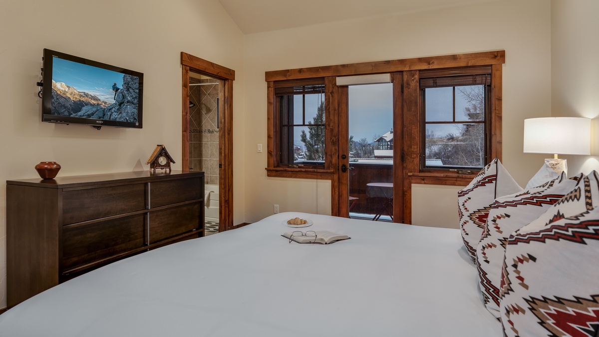 King suite on upper level with balcony