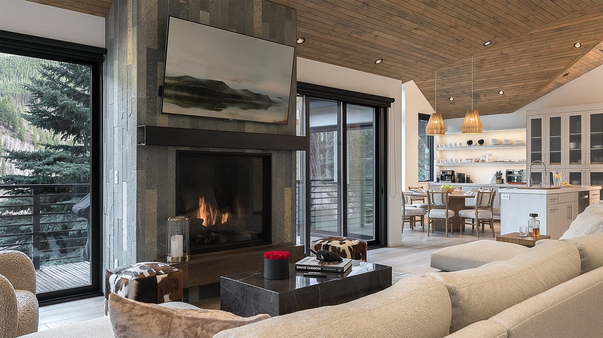 Great Room, Upper Level - Seating area with fireplace and TV