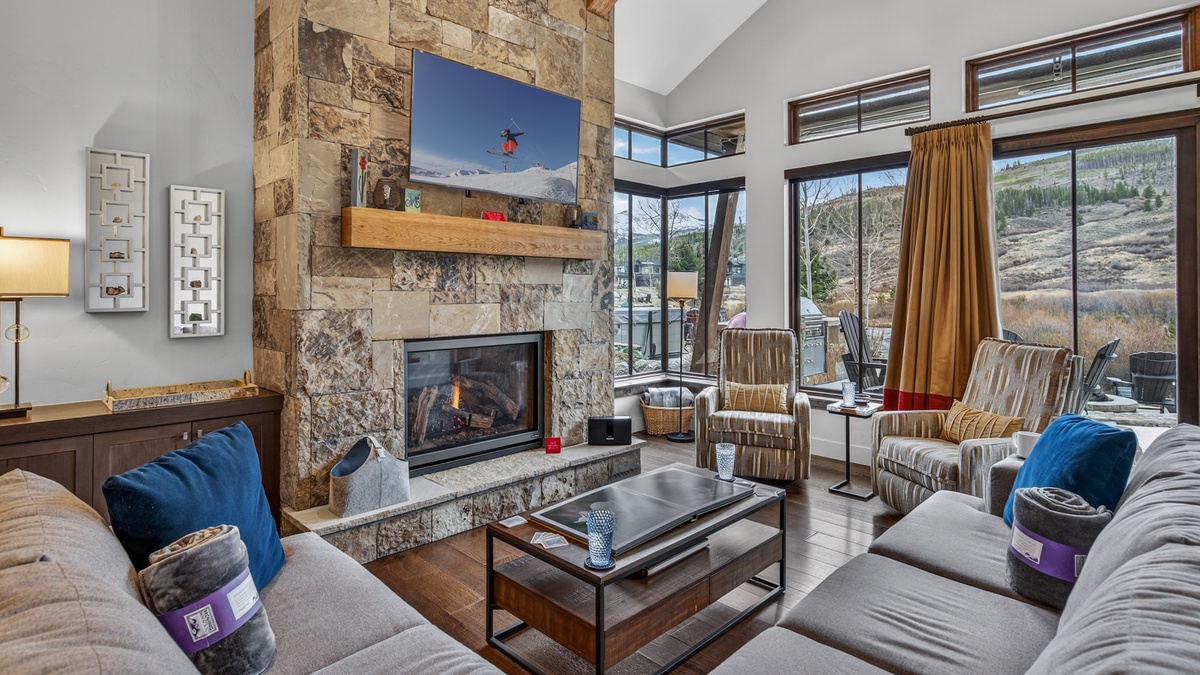 Great Room, Main Level - Seating area with fireplace and TV