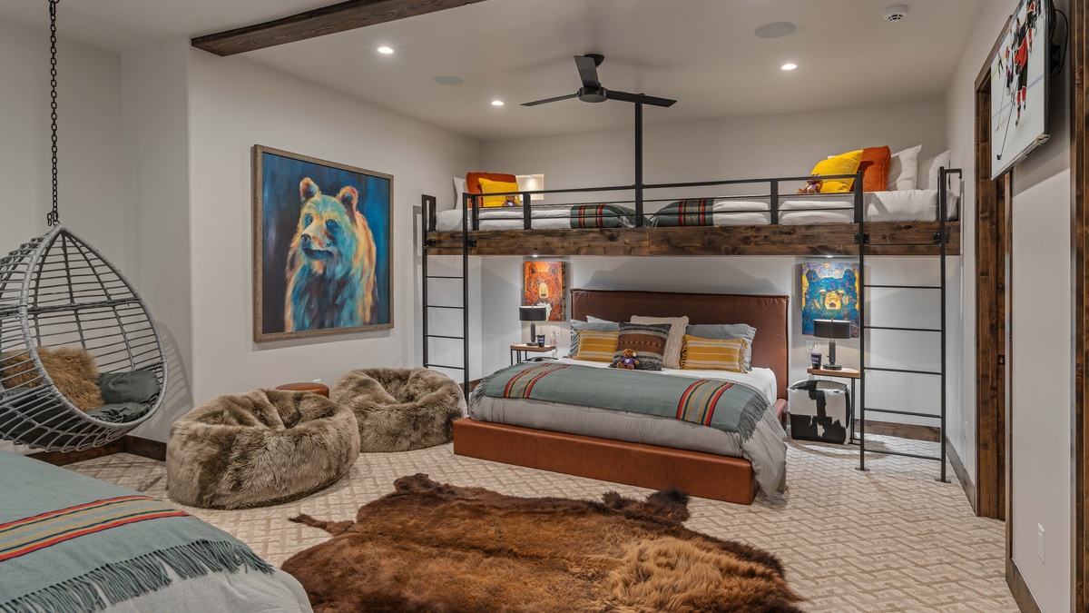 Bedroom 2, Lower Level - Fun and colorful bunk room on lower level, with two bunk beds - both with two twin beds over a king bed, sleeping 8 people