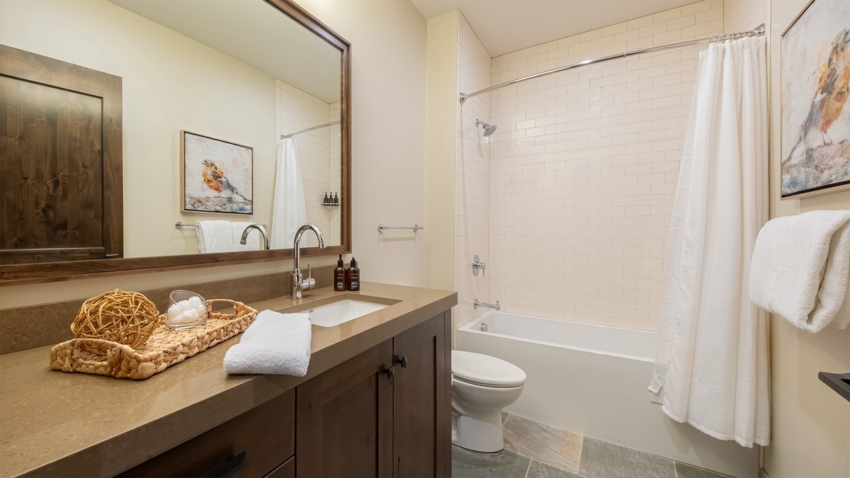 Shared Bathroom, Main Level - Hallway bathroom adjacent to Bedrooms 2 and 5