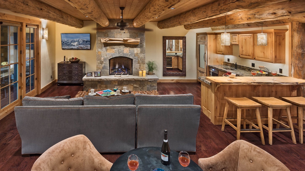 Lower level family room with wet bar, fireplace, south side