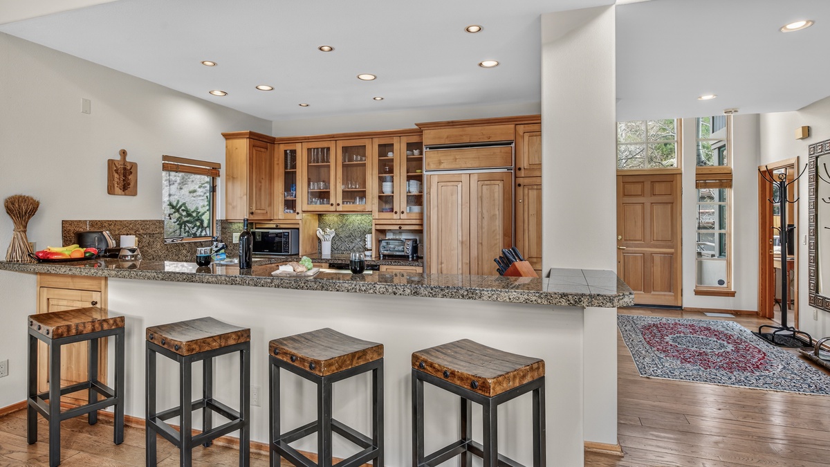 Kitchen, Main Level - Island with bar seating