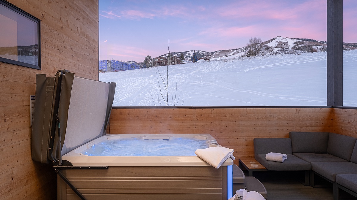 Private soaking views of the winter mountain