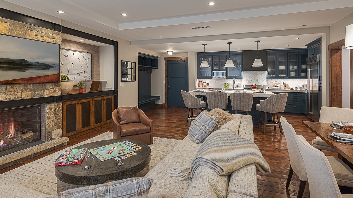 Great Room, Main Level - Open-concept living area flowing into kitchen and entry