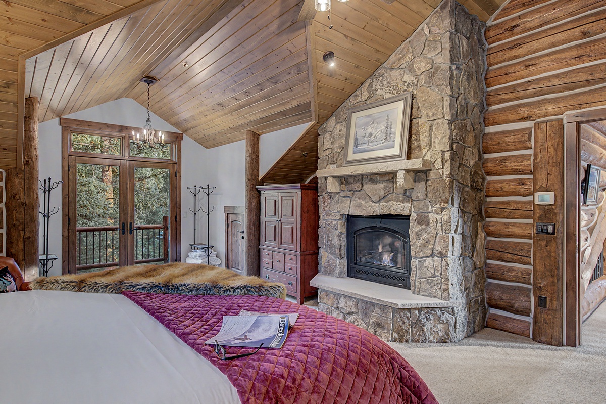 Bedroom 1, Upper Level - Primary king bedroom with fireplace