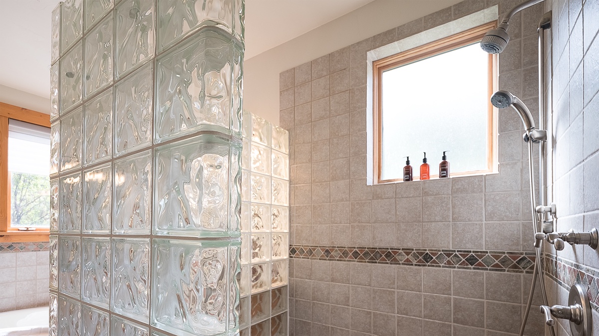 Bedroom 1, Main Level - Primary ensuite with walk-in shower