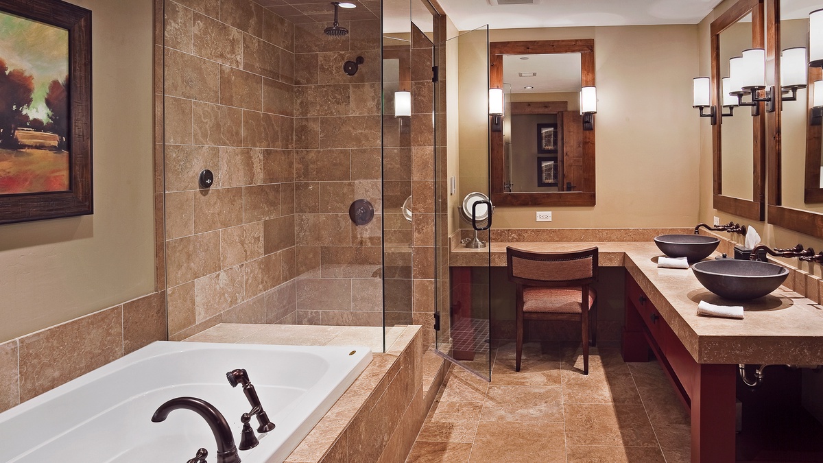 Bedroom 1, Main Level - Primary ensuite with soaking tub and walk-in shower