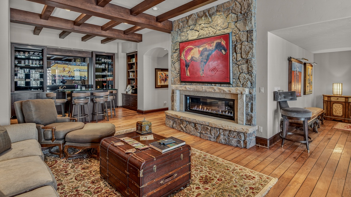 Living Room, Lower Level - Seating area with fireplace