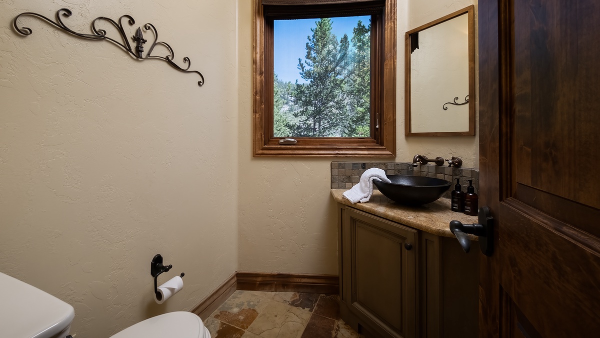 Powder room next to main level laundry