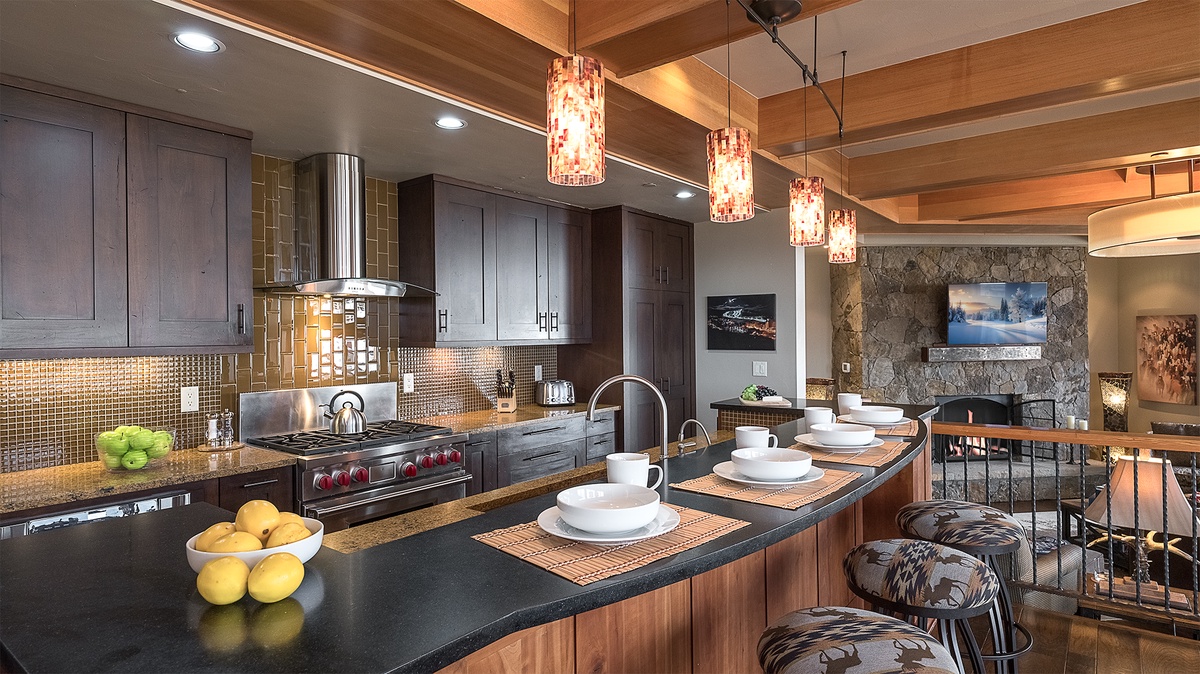 Kitchen, Main Level, Storm Peak Chalet - Bar seating with range and pendant lighting