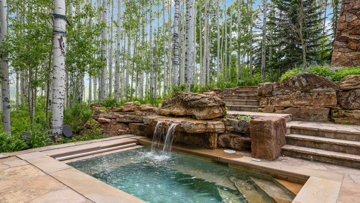 Outdoor in-ground hot tub or summertime plunge pool