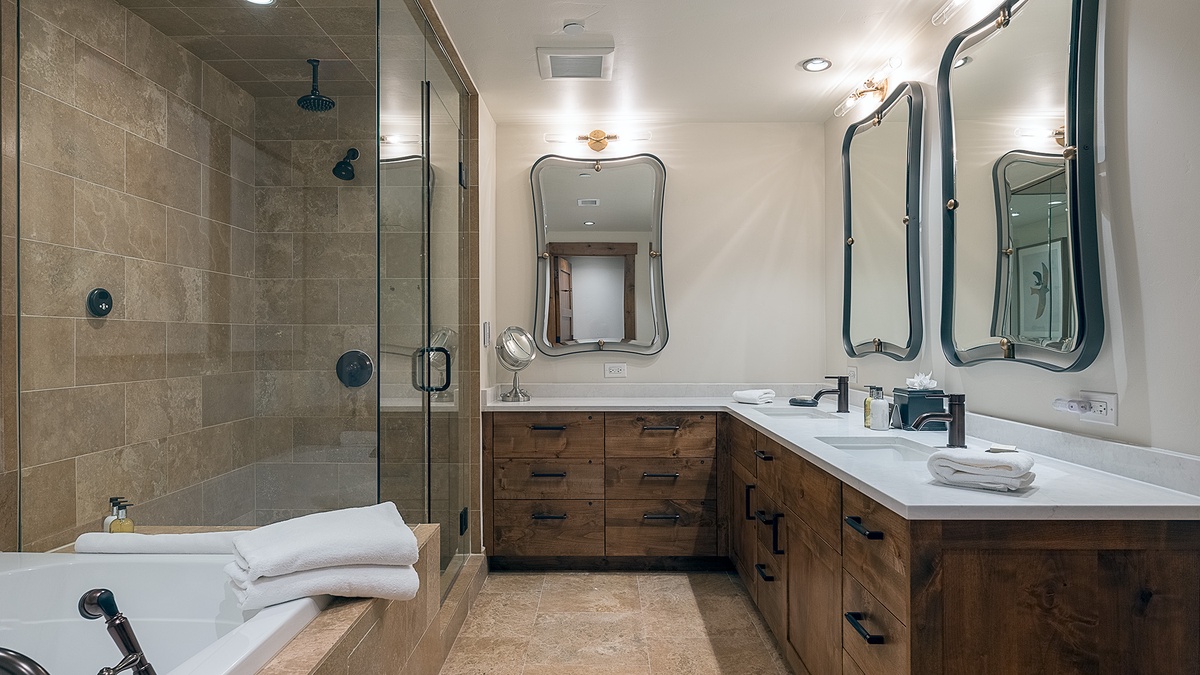 Bedroom 1, Main Level - Primary ensuite with double vanity and walk in shower