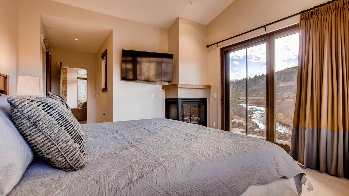 Bedroom 1, Main Level - Primary suite on main level with fireplace, TV