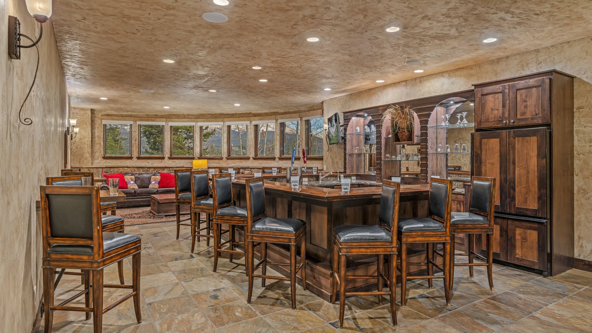 Lower level bar and seating with mountain views
