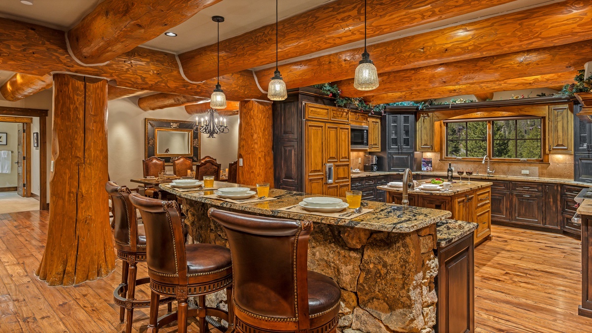Gourmet kitchen with breakfast bar seating
