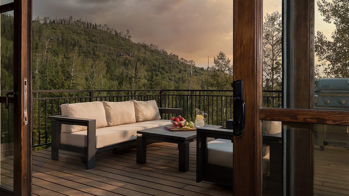 Deck, Main Level - Outdoor seating with grill and mountain views