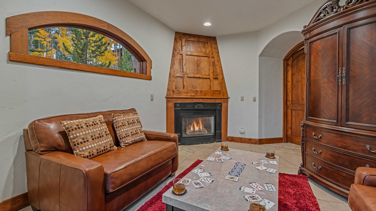 Private sitting area with fireplace on main level, and 2 sofa beds