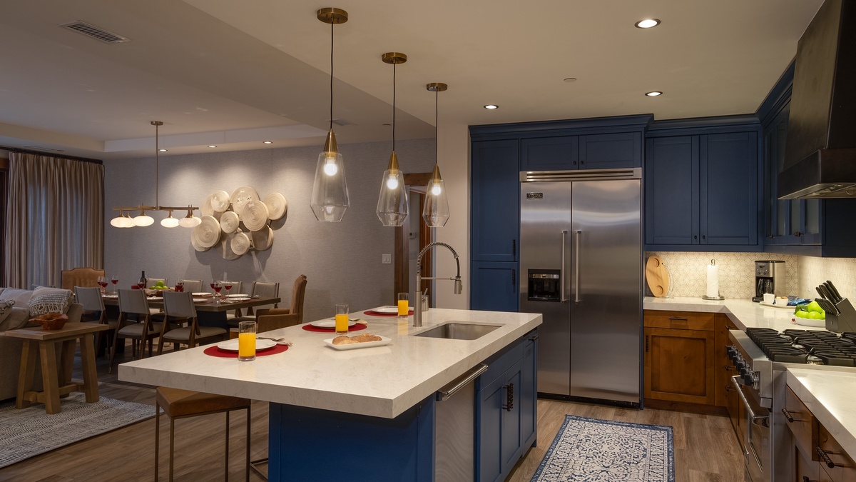 Kitchen, Main Level - Island seating with stainless steel appliances and open layout