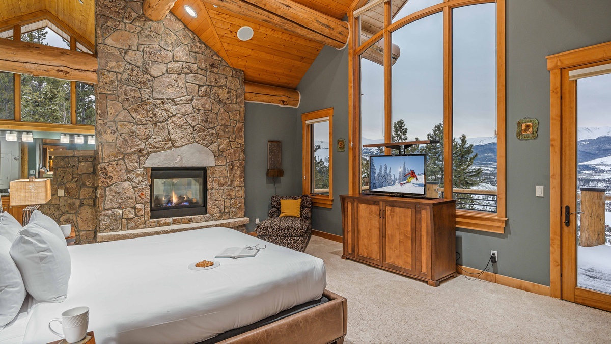 Bedroom 1, Upper Level - Primary suite on upper level with fireplace and views