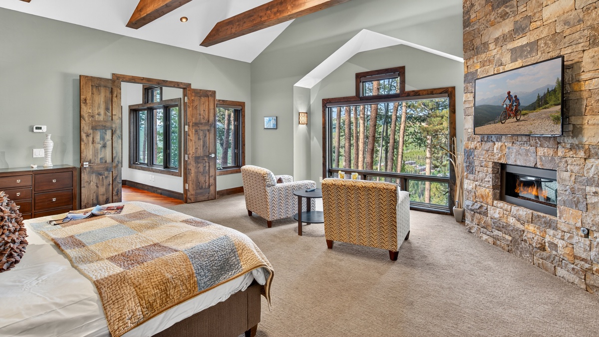 Bedroom 1, Main Level - Primary suite with fireplace and seating area