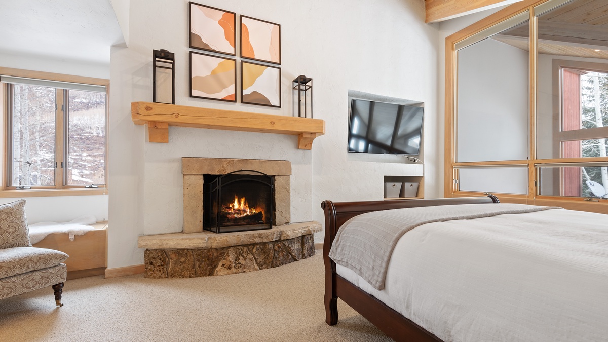 Bedroom with fire place - South
